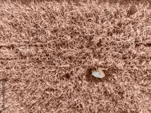 Aerial view of woman lying ...