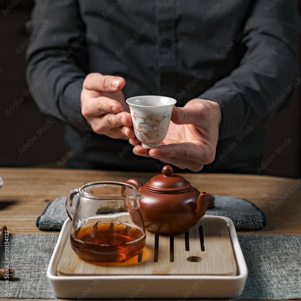 An Elegant Tea Ceremony featuring a Traditional Tea Set alongside exquisite Fine Tea An Elegant Tea Ceremony featuring a Traditional Tea Set alongside exquisite Fine Tea