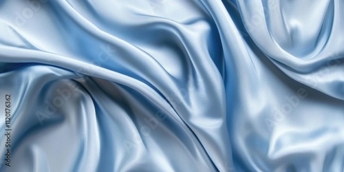 Abstract flowing silk fabric texture, beautiful draped shimmering satin background in powder blue