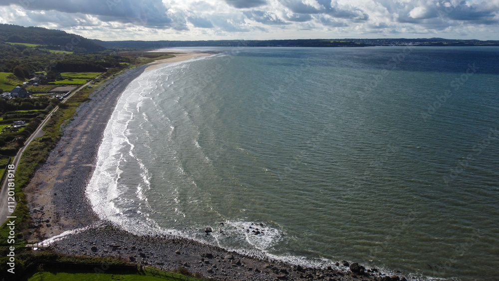 Aerial view of quiet bay and beach on Anglesey Aerial view of quiet bay and beach on Anglesey