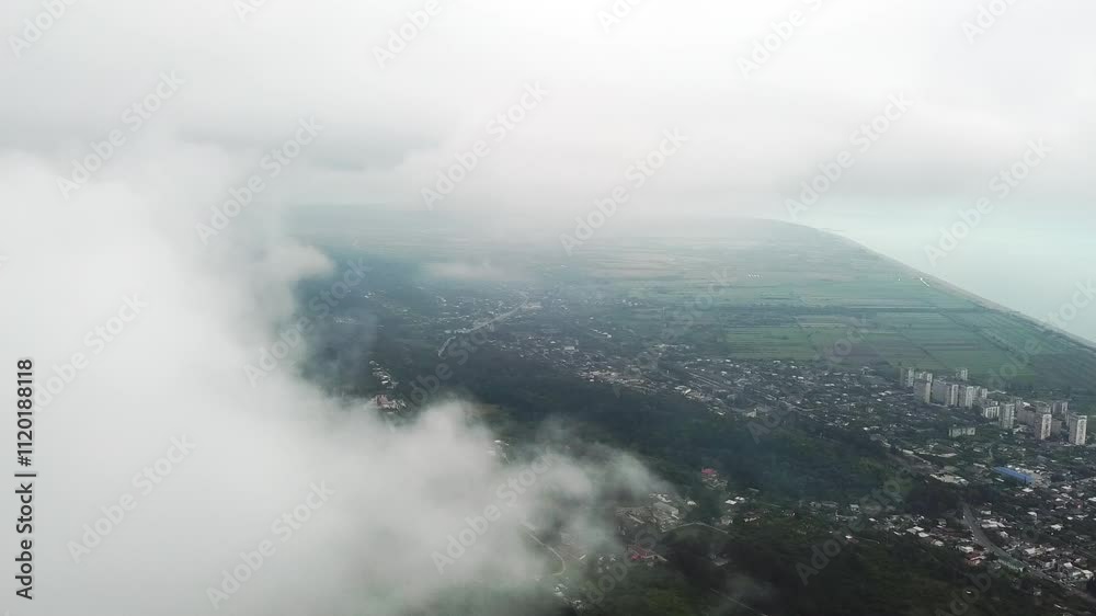 Mountainside with forest under clouds Mountainside with forest under clouds