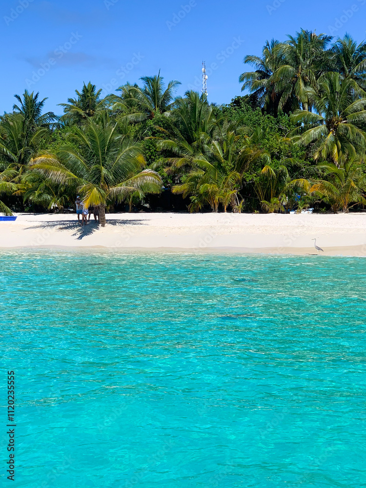 Obraz premium Amazing summer holiday vacation in Maafushi island, Maldives - amazing trip with beautiful blue sky and clear blue sea, with soft white sand 