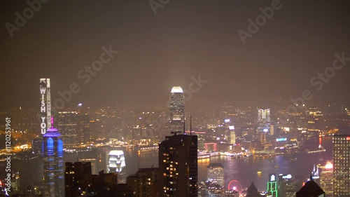 Beautiful panoramic view on Hong Kong Victoria Harbour at night in the city center