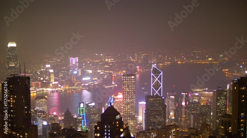 Beautiful panoramic view on Hong Kong and Victoria Harbour at night. Big city lights
