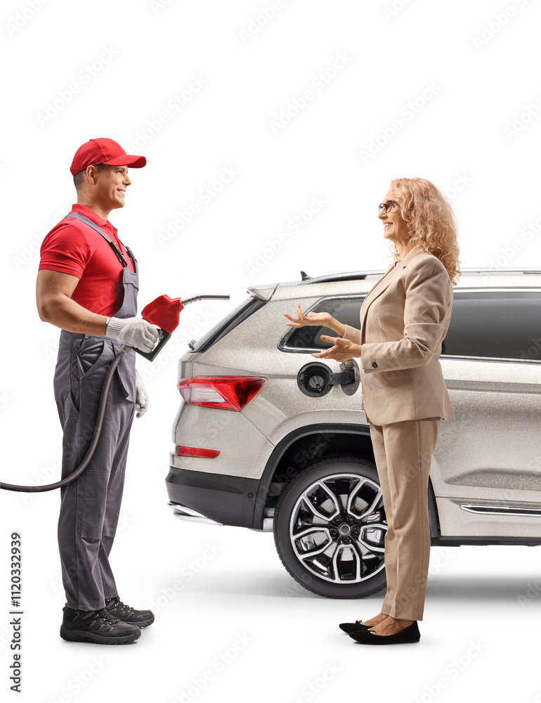 Female driver with a suv and a petrol station worker having a conversation Female driver with a suv and a petrol station worker having a conversation