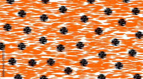 Vibrant Orange and Black Polka Dot Pattern. A lively polka dot design featuring contrasting orange and black elements on a textured white background.