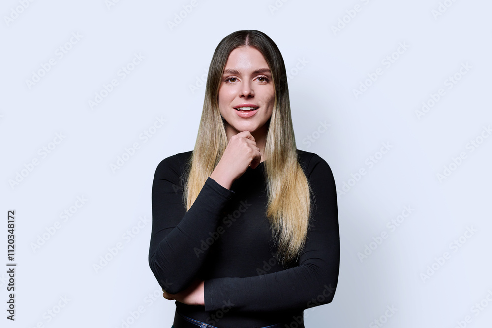 Portrait young smiling woman on white studio background Portrait young smiling woman on white studio background