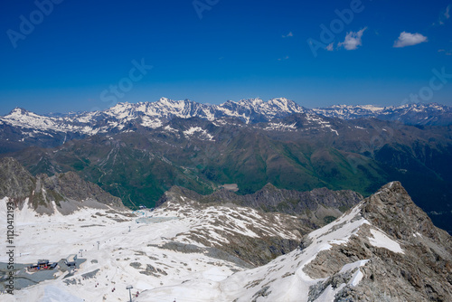 Breathtaking View of the Italian Alps Captured in Vermiglio Showcasing Snow-Capped Peaks and Lush Valleys