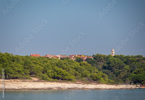 Panoramic view of coastal town Premantura, Istria peninsula, Croatia, Europe. Most southerly point of Istrian peninsula, Cape Kamenjak. Idyllic coastline Kvarner Gulf, Adriatic Mediterranean Sea photo