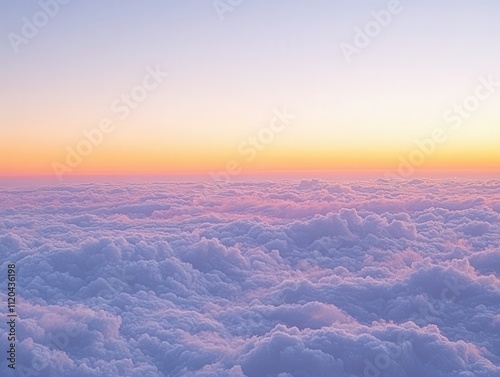 Serene Vibrant Sunset over Soft Fluffy Clouds in the Sky