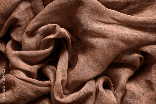 Brown mocha mousse color cotton fabric background. Color of the year 2025.