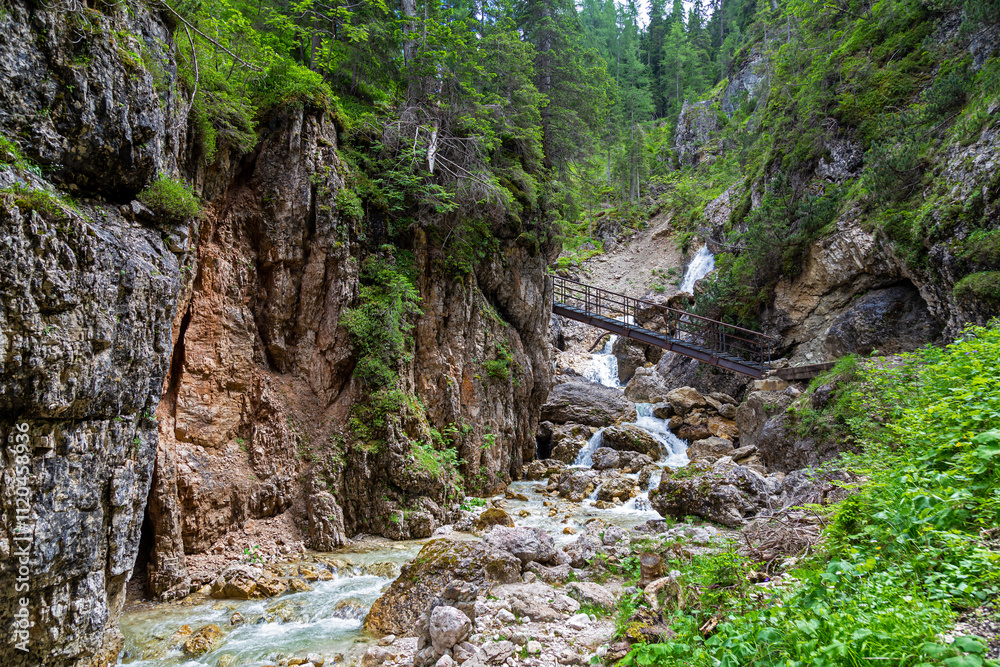 Gorges of Federa tourist trail. Waterfalls in forest. Dolomites mountains Gorges of Federa tourist trail. Waterfalls in forest. Dolomites mountains