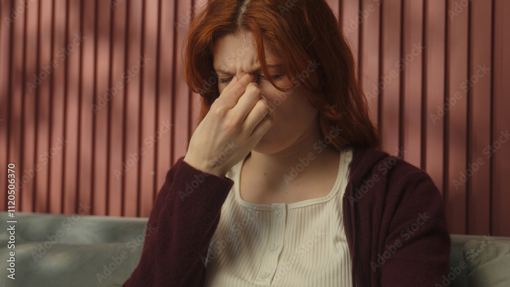 Unwell sad tired woman Caucasian girl female at home suffer migraine headache symptom pain touch head eyes strain health problem sick lady worried influenza fever hurt medicine healthcare insurance