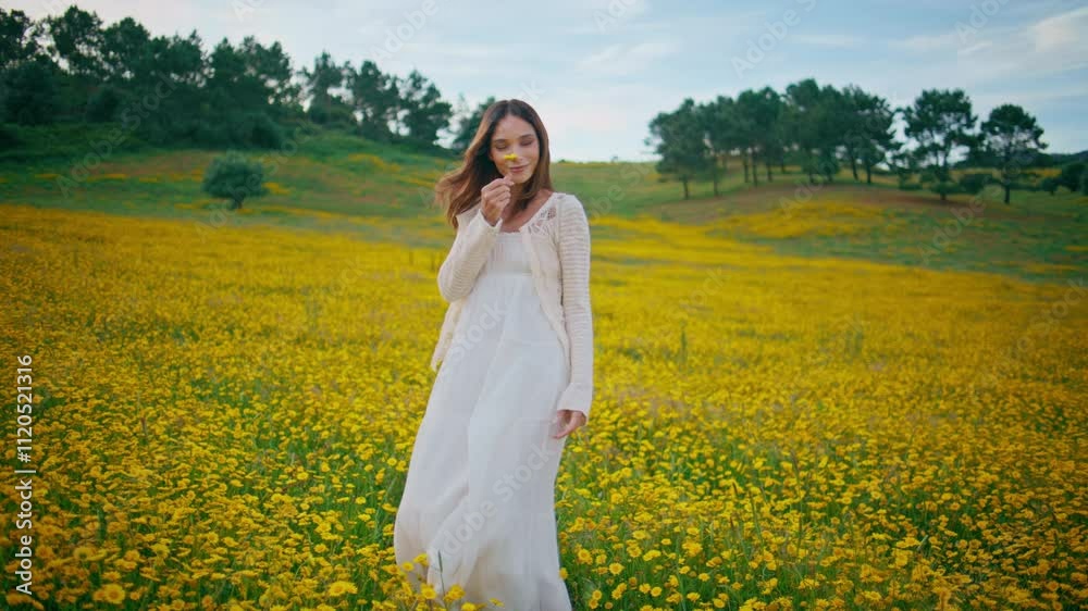 Country woman enjoy flowers plantation gloomy summer day. Girl taking bloom Country woman enjoy flowers plantation gloomy summer day. Girl taking bloom