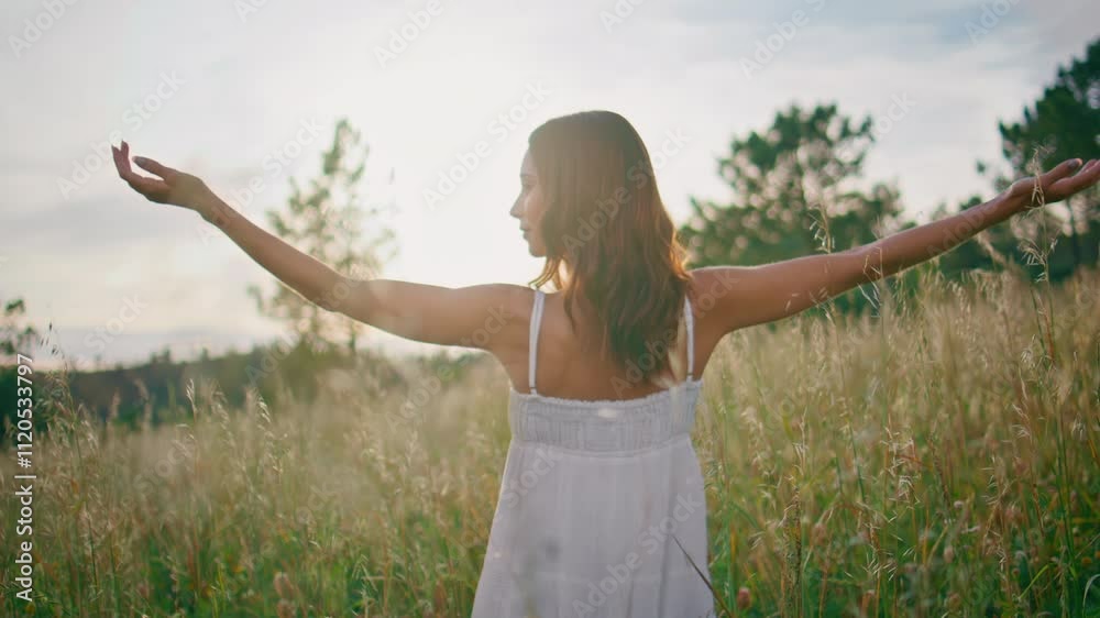 Nature woman spreading arms meeting sunshine closeup. Model feeling freedom Nature woman spreading arms meeting sunshine closeup. Model feeling freedom