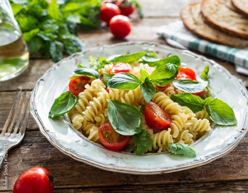 Simple Yet Delicious Pasta Salads Highlighted in Fresh and Rustic Food Photography photo