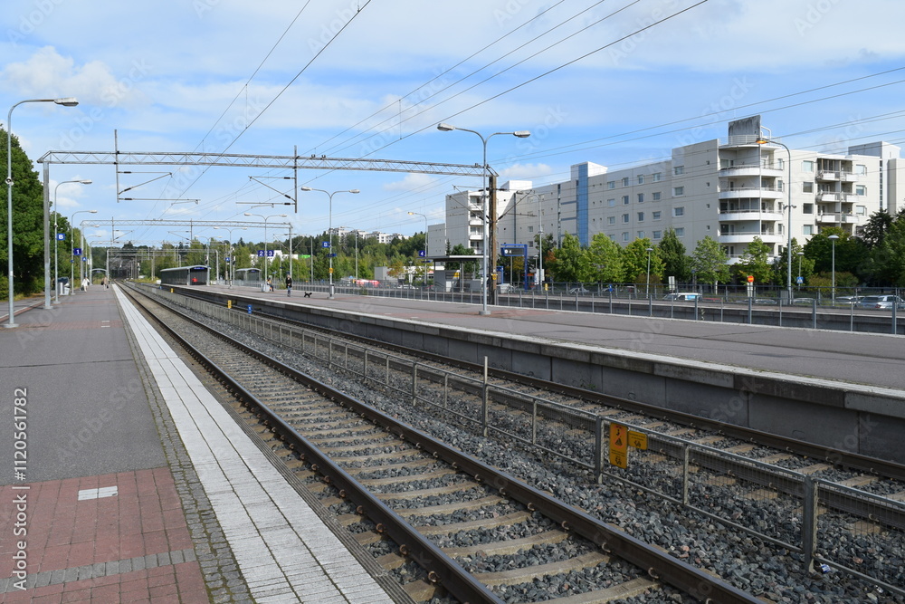 Obraz premium Espoo railway station is a railway station in the district of Espoon keskus in the city of Espoo, Finland. It is between the stations of Tuomarila and Kauklahti.