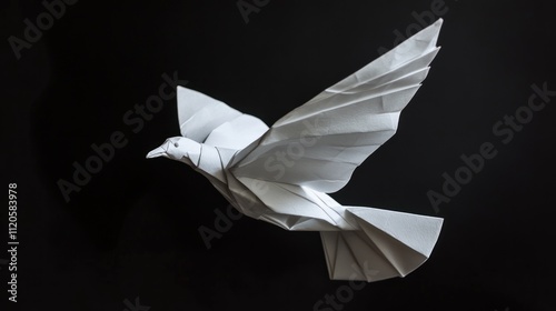 A beautifully crafted white origami bird in flight against a black background.