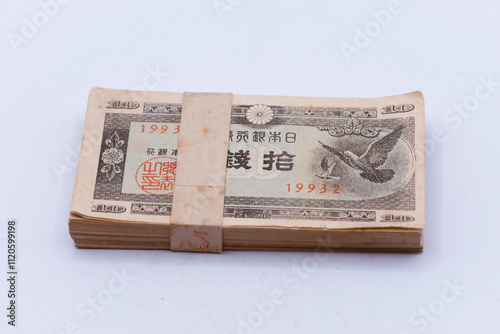 a bundle of japanese 10 sen banknotes. japanese banknotes from 1947 showa period. photo