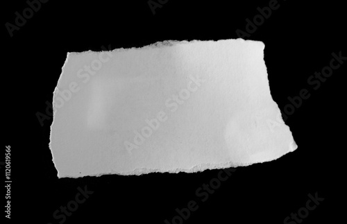 Torn rip paper texture on black background