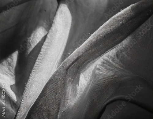 folds and tears of fabric as a dark texture as a background