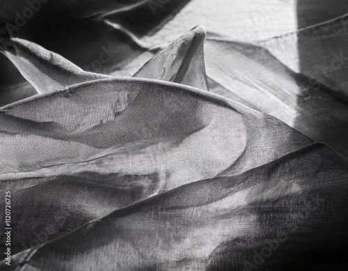 folds and tears of fabric as a dark texture as a background