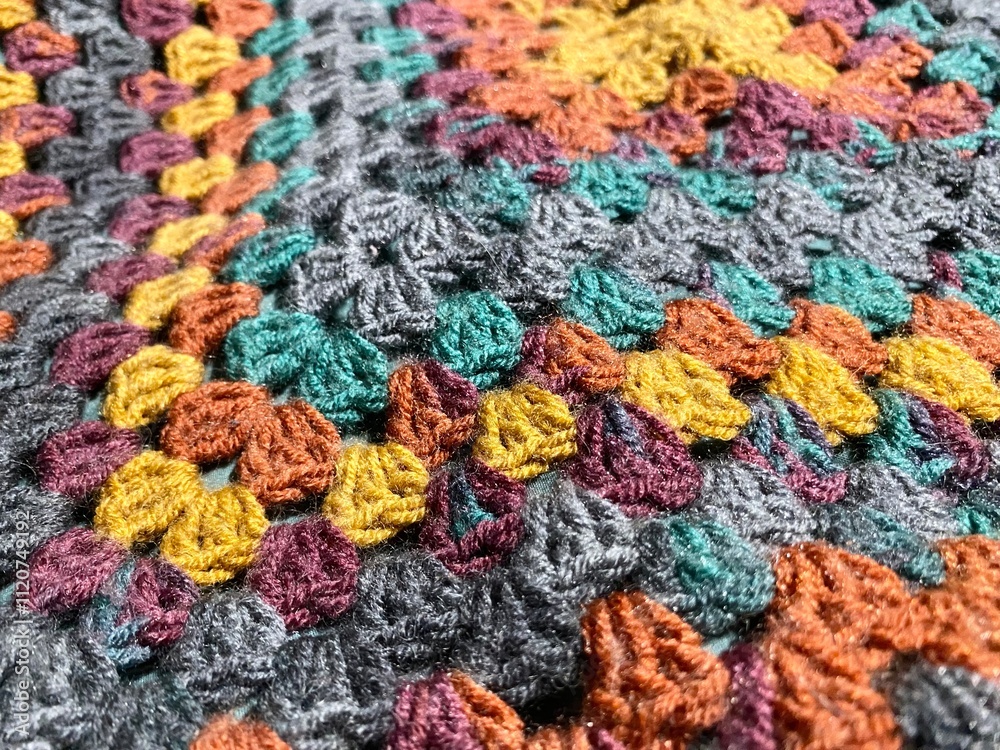 Crochet blanket handmade texture decor artistic background cozy worm photo