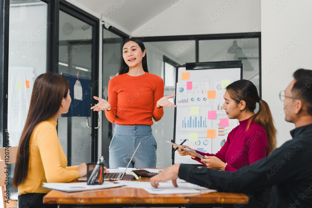 woman presenting ideas to team in modern office woman presenting ideas to team in modern office