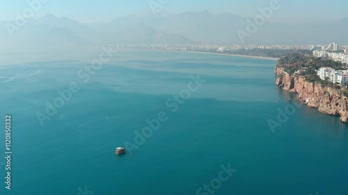 boat in the sea near the city
