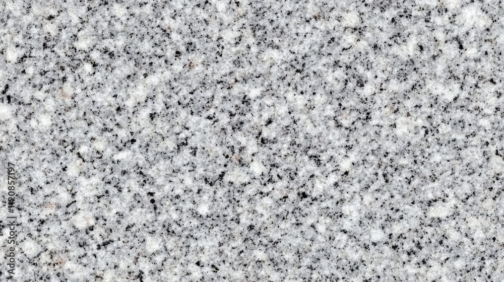 Grey granite texture with speckled pattern suitable for backgrounds or design elements in contemporary architecture and interior projects Grey granite texture with speckled pattern suitable for backgrounds or design elements in contemporary architecture and interior projects
