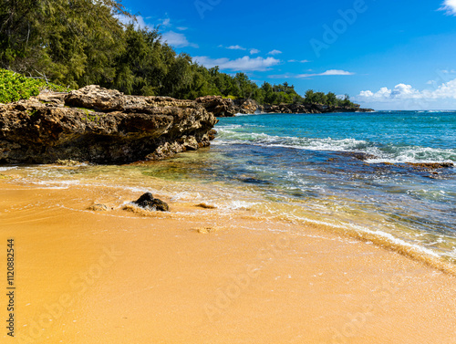 Waves Washing Over Exposed Coral Reef on Kawailoa Bay Beach, Mahaulepu Heritage Trail, Poipu, Kauai, Hawaii, USA photo