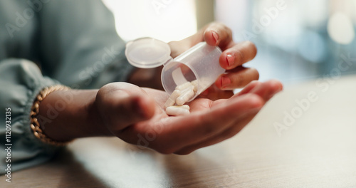 Person, hands and medication with container or pills for healthcare, cure or pain relief at office desk. Closeup, employee or patient with capsules or pharmaceuticals for dosage or prescription meds