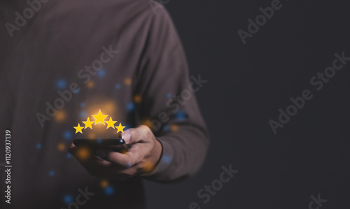 Customer Review, Young Man hand using smartphone mobile with five star to review and give 5 stars with very good results in service, Good review 5 star rating choice feedback