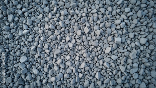 Ultra Realistic Top View of Gray Gravel Stones, A Detailed Flat Lay of Smooth, Gray Pebbles, Perfect for Backgrounds and Textures