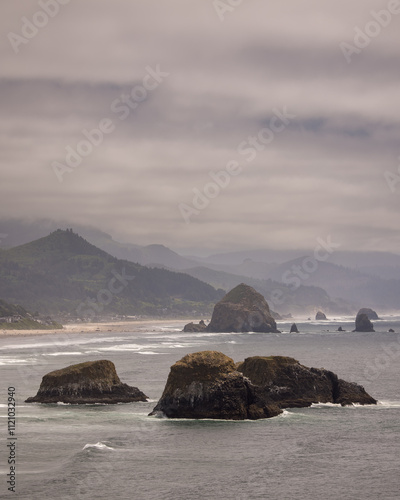 Sea stacks at the Orgon pacific coast in summer time photo