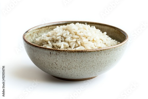 A bowl of cooked white rice sits on a white background photo