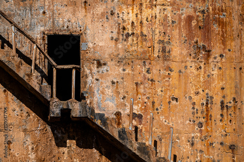 Abandoned hot water well near the Zaouia oasis in the Sahara Desert in Tunisia. photo