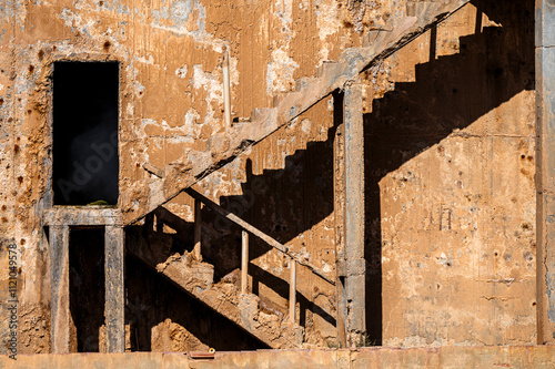 Abandoned hot water well near the Zaouia oasis in the Sahara Desert in Tunisia. photo