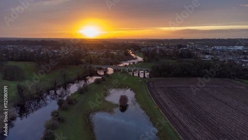 Aerial view of sunrise over flood plain of River Wharfe and town of Tadcaster photo