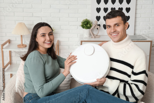 Young couple with modern ro...