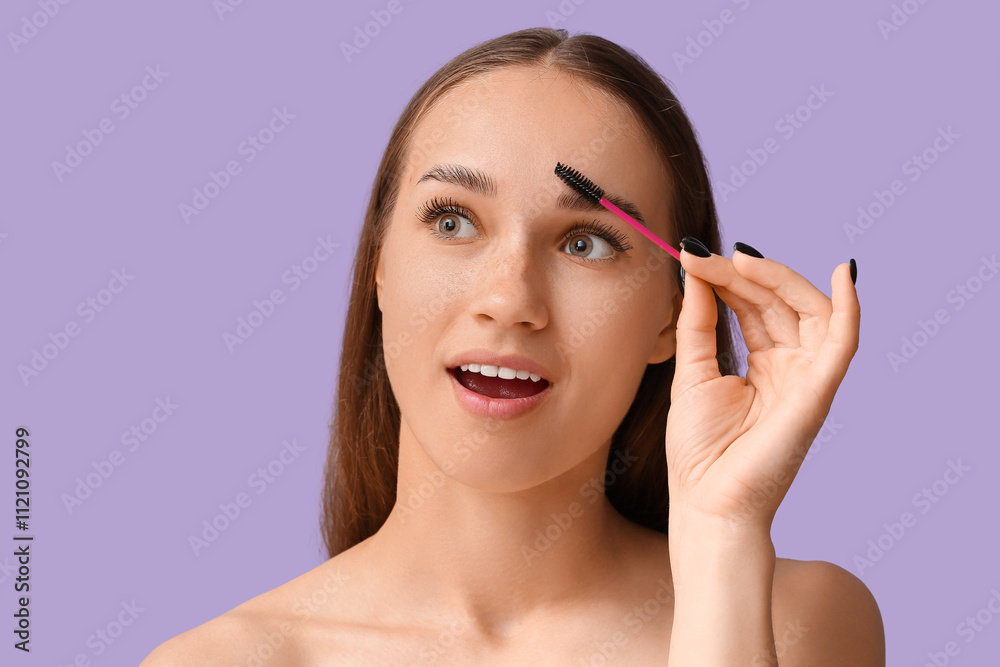 Young woman correcting shape of her eyebrows on lilac background Young woman correcting shape of her eyebrows on lilac background