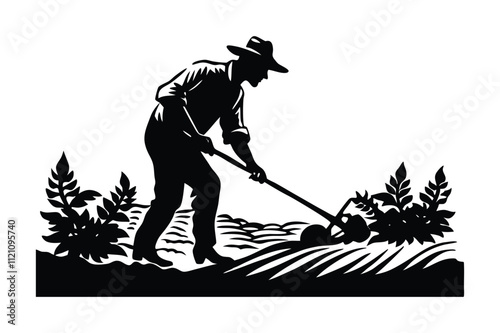 Silhouette of a farmer working in a field