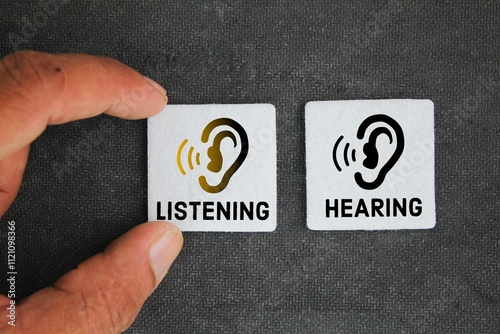 between the words HEARING and LISTENING, choose listening. concept of choosing to listen than just here, pay more attention and understand the meaning behind the words