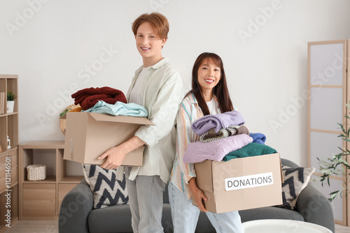Young couple with clothes f...