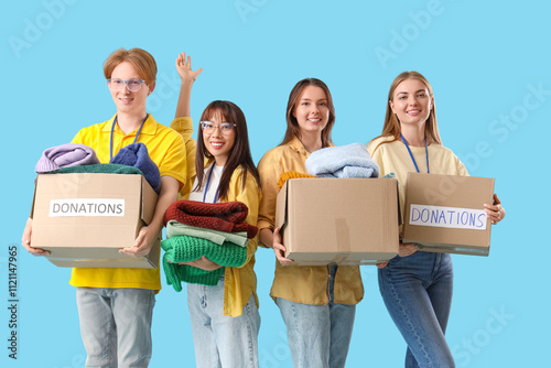 Group of volunteers with do...