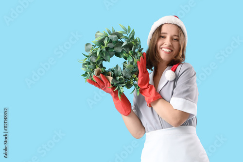 Young chambermaid with Sant...