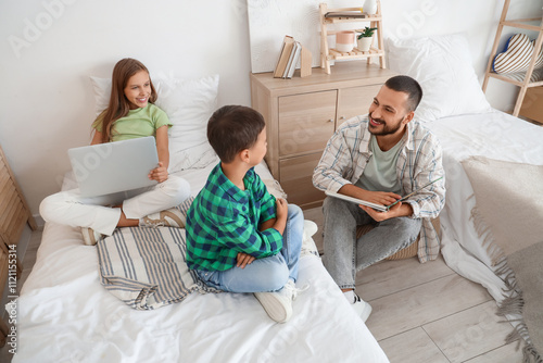 Happy father and children e...