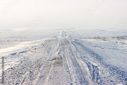 Difficult winter roads in the Arctic tundra. There is no way here in summer. Komi Republic oil and gas region, former Soviet Gulag photo