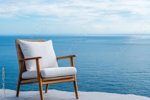 seaside retreat  rattan chair by azure water  gentle sea breeze  ideal for serene contemplation