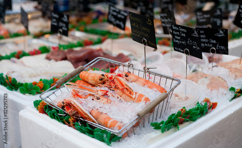 Seafood Market with langustines and fresh prawns. photo